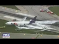 FedEx plane seen flying while on fire near Newark Airport
