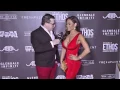 Daphne Joy in a stunning red dress at Project Ethos fashion show