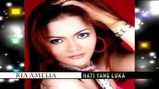 Download Ria Amelia - Hati Yang Luka (Official Music Video) MP3