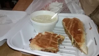 Pulled BBQ Pork cuban sandwich and grits from The Blue Hen Cafe
