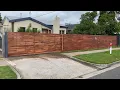SpecRite merbau fence panel feature fence with automatic sliding gate