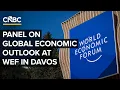 CNBC anchor Andrew Ross Sorkin moderates a panel on global economic outlook in Davos 26