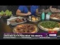 Checking out Pi Pizza near the Heights