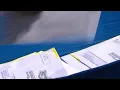 Lawmakers consider bill to create universal absentee ballots