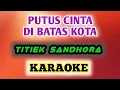 Download Lagu PUTUS CINTA DI BATAS KOTA - TITIEK SANDHORA ( KARAOKE Lagu Nostalgia + Lirik Lagu )