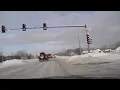 Snow plows clear covered streets in Hoffman Estates