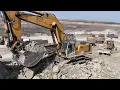 Download Lagu Liebherr 974 Excavator Loading Dump Trucks at a Massive Open-Pit Mine - Ascon LTD