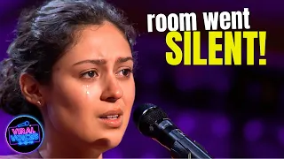 she s shy she stutters then she sings you won t believe it 
