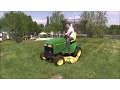 John Deere 425 Mowing