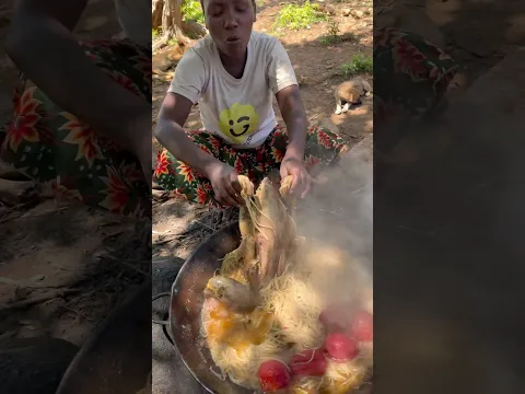 Hadzabe queen roasting spaghetti in the bush