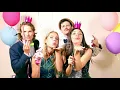 Group of friends having a great time in party photo booth Stock Footage - Envato elements