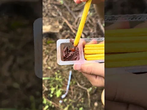 using chocolate as a dipping sauce for candy #bushcraft #survival #shorts