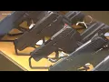 Austin gun shop owner defends assault rifles
