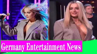 Bebe Rexha narrowly avoids a wardrobe malfunction as she goes SHIRTLESS under a blazer for That s My