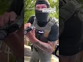Masked ICE Agent Points Gun at Woman Claims She Almost Ran Them Over