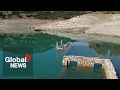 Download Lagu Sunken village of Kallio emerges in Greece as drought dries up lake
