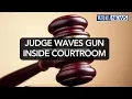 Lee County Judge accused of waving gun in the courtroom now under review