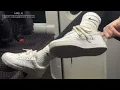 Nike Air force 1 sneakers and Nike white crew socks on the bus