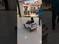 Download Lagu Kid driving car in a mall