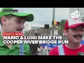 Mario Luigi make it to the finish line of the 2026 Cooper River Bridge Run