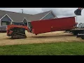 Unloading New Dumpsters