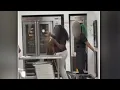 shows Crumbl Cookies employees doing hair inside Charlotte store