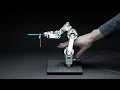 Singularity crossing with the world s smallest industrial robot arm