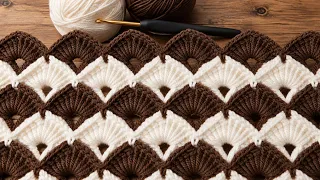 Wow! This crochet tulip pattern makes for a very easy and beautiful blanket or scarf design