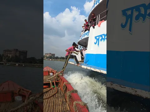 How the trawler tied up to the movable asset launch in a hurry. How the hawkers got on the ship