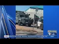 Large law enforcement presence for warrant