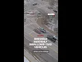 CAUGHT ON CAMERA Sinkhole swallows two vehicles on busy Nebraska roadway