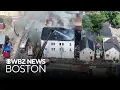 Fire spreads to 3 buildings in Lawrence