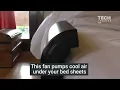This fan attaches to your bed and blows cool air under your covers
