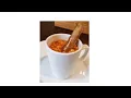 Mug of beans with a sausage -
