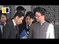 Video of Japan envoy’s ‘bow’ to Chinese counterpart sparks complaint