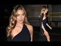 Arabella Chi goes braless in a revealing one-shoulder black maxi gown with racy thigh-high split
