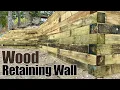 We Built a Retaining Wall out of Wood Steps to make it last