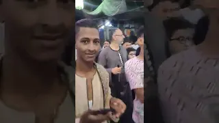 السمك والرز باللبن نفحات توزع امام مقام سيدي جلال الاسيوطي 