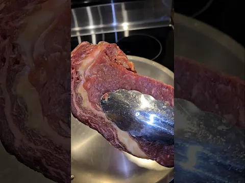2 steaks 1 stainless steel pan