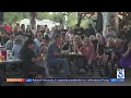 Candlelight vigil honors victims of deadly shooting at Cook s Corner bar