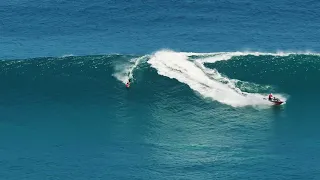 Big Uluwatu tow in surfing