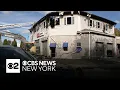 shows aftermath of auto body shop fire in Dover N J