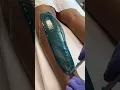 Lower leg wax service using blue hard wax formula from Starpil