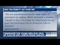 Fundraiser for young men who held up flag on UNC campus raises 500 000