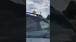 Homicide suspect SHOOTS at troopers in high speed chase