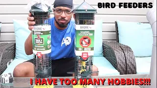 BROME BIRD FEEDERS ONE FROM WALMART ONE FROM LOWES