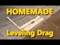 Flattening the lawn with a homemade drag Midwest Lawn Renovation 2021