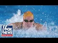 Police investigating mysterious death of champion swimmer