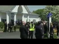 Blue ribbons were tied to utility poles and trees in this Long Island neighborhood as thousands of o