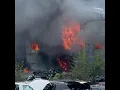 Witnesses record flames smoke sound of explosions at junkyard fire